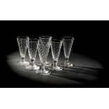 *Glasses. A matched set of six George III wrythen moudled ale glasses, circa 1810, with swirl