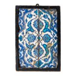 *Persian Tiles. A pair of 16th-century Iznik blue and white pottery tiles, of rectangular form