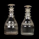 *Decanters. A pair of George III glass decanters, circa 1820, mallet form with diamond cut