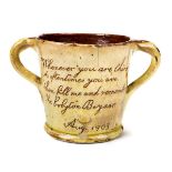 *Bideford. An Bideford pottery loving cup, incised 'Whenever you are thirsty As often times you are,