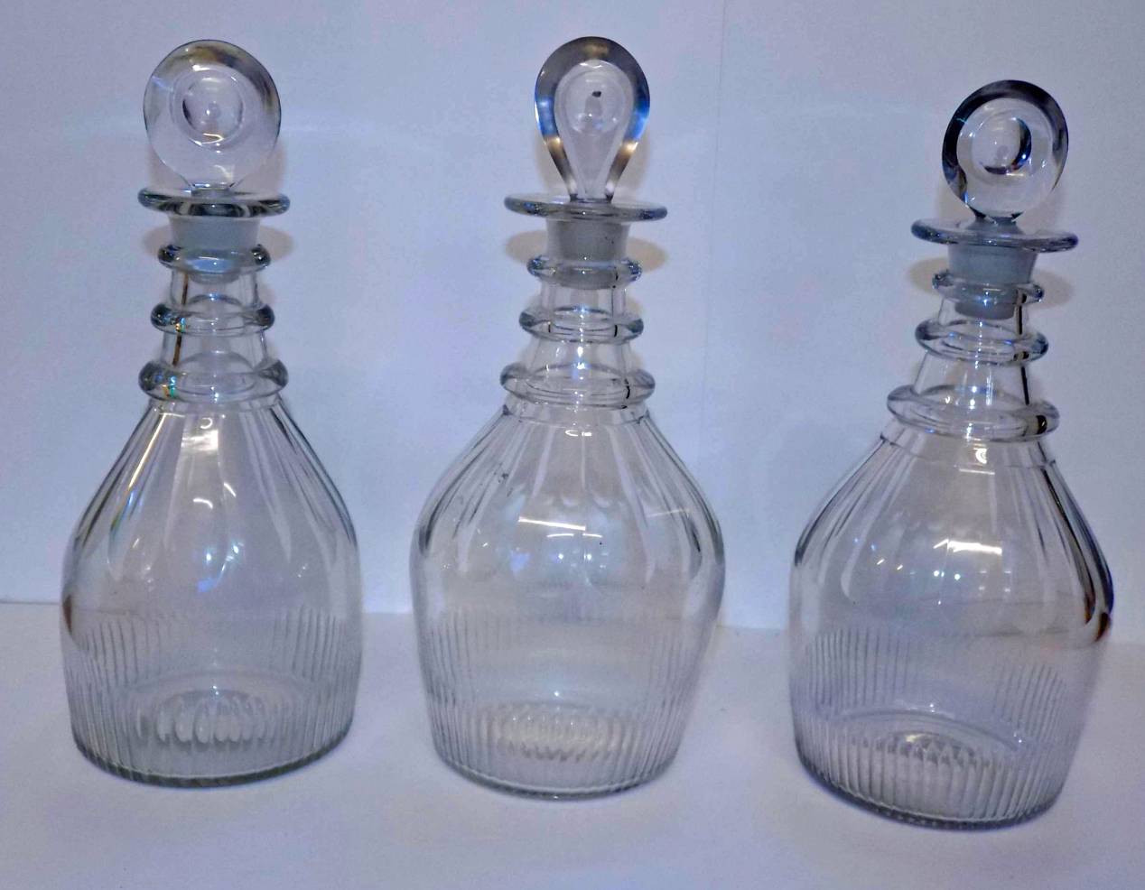 *Decanters. A mixed collection of Georgian glass decanters, including triple neck decanters (three - Image 2 of 3