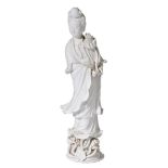 *Blanc de Chine. A Chinese porcelain figure of Guanyin, late 19th or early 20th century, moulded