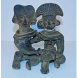 *Figures. A Pre Colombian style terracotta figural group modelled as a couple in ceremonial dress,