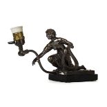 *Piano lamp. An Art Nouveau patinated spelter piano lamp, modelled as female kneeling whilst leaning