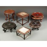 SIX CHINESE HARDWOOD STANDS including two square marble-topped examples (6)
