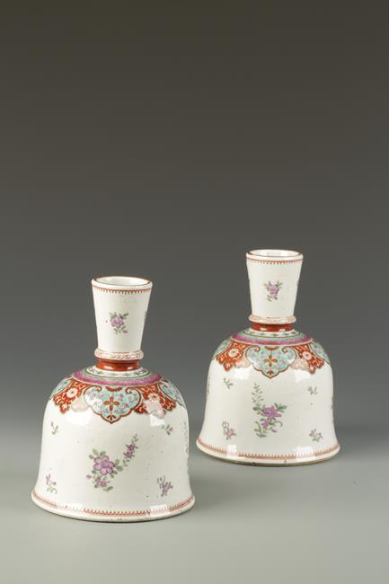 A PAIR OF CHINESE FAMILLE ROSE HOOKAH BASES, the shoulder with a ruyi band with flowers below, the