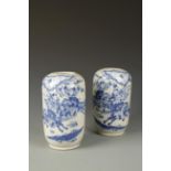 A PAIR OF CHINESE BLUE AND WHITE CYLINDRICAL VASES decorated in low relief with warriors, late Qing,