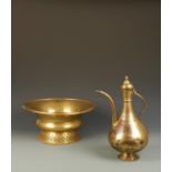 A TURKISH GILT-COPPER EWER AND BASIN, the pear-shaped ewer with a curved spout, 16.5" high, the