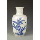 A LARGE CHINESE BLUE AND WHITE VASE decorated with flowers and butterflies on a crackle ground, late