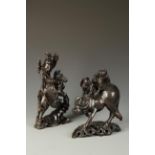 TWO SIMILAR CHINESE SILVER-INLAID HARDWOOD FIGURES, late Qing-Republic, the larger figure of a