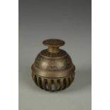 AN INDIAN NIELLO-DECORATED HAND BELL in the form of a finger citrus, the domed top with foliate