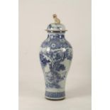 A MASSIVE CHINESE BLUE AND WHITE COVERED VASE, the neck decorated with a landscape scene above a