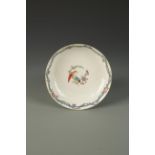 A WORCESTER SAUCER DISH painted in the Chinese famille rose palette, Old Worcester Parrot pattern,