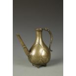 A MUGHAL BRASS PEAR-SHAPED EWER engraved with repeating floral motifs, 18th/19th century, 8.25"