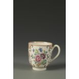 A WORCESTER COFFEE CUP decorated in the Chinese famille rose style with flowers within iron red