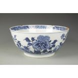 A LARGE CHINESE BLUE AND WHITE BOWL decorated with birds and flowers, Qing, 15.5" dia.