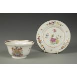 A CHINESE FAMILLE ROSE ARMORIAL BOWL with two heraldic panels and flowers, Qianlong, 4.5" dia.;