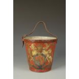 A RED PAINTED LEATHER FIRE BUCKET decorated with a Royal coat of arms, 19th century, 10.75" high