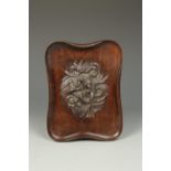 A CHINESE HARDWOOD QUATREFOIL TRAY, the centre carved in high-relief with a waterdragon emerging