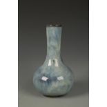 A CHINESE SHIWAN FLAMBE BOTTLE VASE, late Qing/Republic, 8.75" high