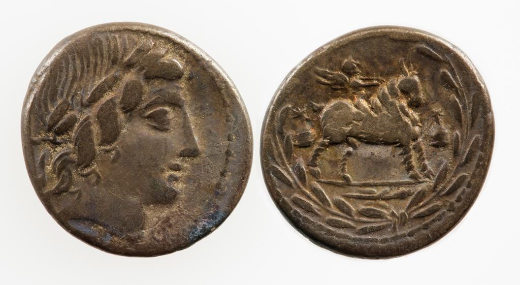ROMAN REPUBLIC. MANIUS FONTEIUS, 85 B.C. AR DENARIUS. Laureate head of Apollo right, Cupid on goat