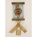 A SILVER GILT AND ENAMELED MASONIC JEWEL/MEDAL, Arnold Lodge, with presentation inscription