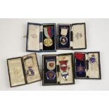 SILVER GILT AND ENAMELED MASONIC CHARITY JEWELS/MEDALS, includingSteward and other types, various