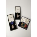 TWO SILVER AND ENAMEL MASONIC JEWELS/MEDALS, Sole Salubritas, and a set of miniature medals. (7