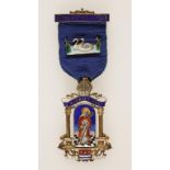 A SILVER GILT AND ENAMELED MASONIC JEWEL/MEDAL, St Modwen's Lodge No. 4850, with presentation