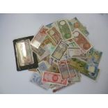 A COLLECTION OF WORLD BANKNOTES, including Egypt, Portugal, Spain, Brasil and other countries.