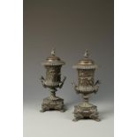 A PAIR OF CAST AND PATINATED BRONZE "COLZA" OIL LAMPS of classical vase form, with flame mounted