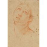 BOLOGNESE SCHOOL, 17th century A study of a head, the eyes gazing skyward, red chalk, 7" x 4.75",