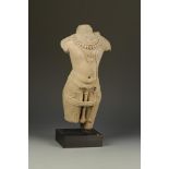 AN INDIAN SANDSTONE MALE TORSO