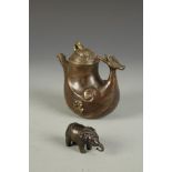 A SMALL BRONZE INDIAN ELEPHANT