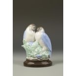 A POOLE POTTERY ORNAMENT "LOVE BIRDS"