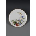 A MEISSEN CABINET PLATE decorated with a floral spra