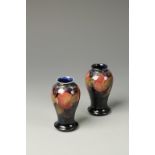 A SMALL PAIR OF MOORCROFT POMEGRANATE VASES