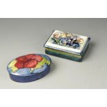 A MOORCROFT BOX AND COVER in the 'Spring Flowers' pattern