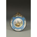 A SEVRES PLATE with a central painted scene of a shepherd and shepherdess