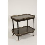 A BLACK JAPANNED AND GILT TWO TIER SHAPED RECTANGULAR ETAGERE