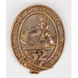 A WILLIAM IV SILVER-GILT LONDON ASSURANCE FIREMAN'S ARM BADGE, oval with Hibernia seated in the