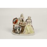 A MEISSEN STYLE PORCELAIN FIGURAL GROUP, 'The chess players', a lady and gentleman seated playing