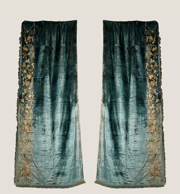 A SUITE OF SEA-GREEN VELVET CURTAINS, probably 19th century, each 120" x 56" with floral