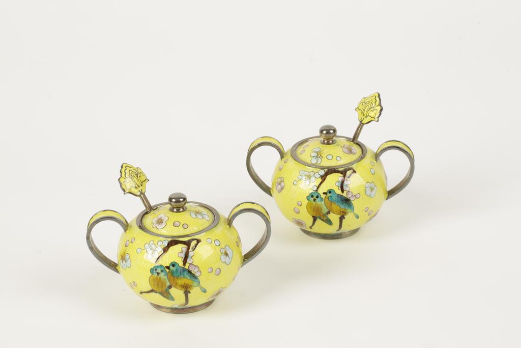 A PAIR OF MODERN ORIENTAL TWO HANDLED SUGAR BOWLS with matching spoons, of spreading circular