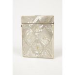 A CARVED VICTORIAN MOTHER OF PEARL CARD CASE, the mother of pearl sections each engraved overall