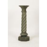 A VICTORIAN GREEN MARBLE COLUMN with an octagonal base supporting a spirally fluted stem and a