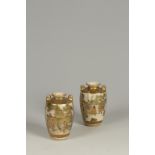 A PAIR OF JAPANESE SATSUMA MINIATURE VASES, decorated with female figures standing by buildings