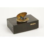 A 19TH CENTURY SWISS TORTOISESHELL MUSICAL BOX, the tortoiseshell body with hinged lid in yellow and