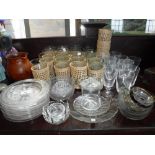 A COLLECTION OF 19TH CENTURY ICE PLATES, a collection of glass tumblers with woven covers and