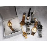 A LADIES' YELLOW STAINLESS STEEL WRISTWATCH and other similar items